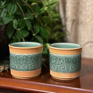 Green oriental tea cups