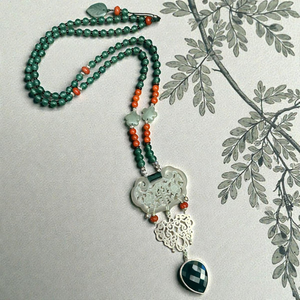 Carved Jade Necklace with Green Onyx Drop and a Silver Pendant