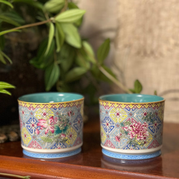 Green intricate teacups