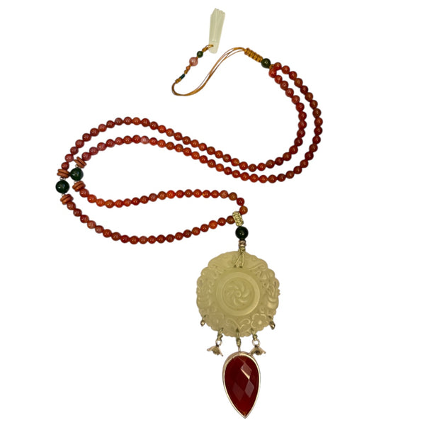 Carved Jade Necklace with Red Onyx Drop