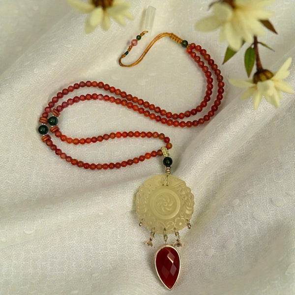 Carved Jade Necklace with Red Onyx Drop